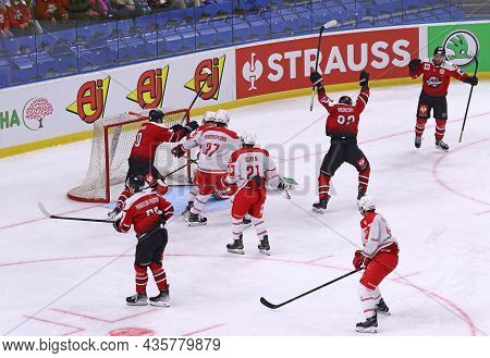 Kyiv, Ukraine - October 6, 2021: Hc Donbass Players React After Viktar Turkin (r) Scored A Goal Duri