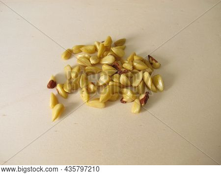 Shelled Beechnuts Without Hull On A Wooden Board