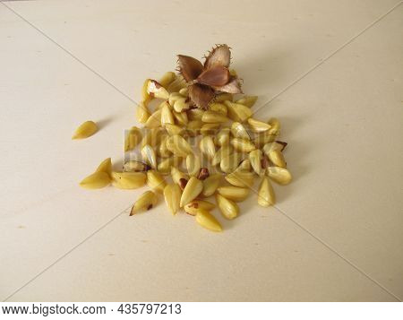 Shelled Beechnuts Without Hull On A Wooden Board