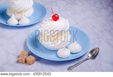Cream Meringue Cake On White Plate On Marble Background