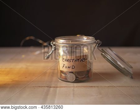 Christmas Savings Fund In Glass Jar To Buy Gifts