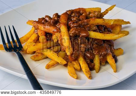 Close Up Of Chilli Fries On A Plate
