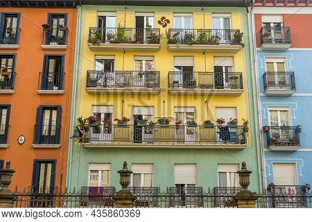 Tourism, Colorful building facade in the old town of Pamplona, ??Navarra, Spain. Streets where San FermÃ­n is celebrated