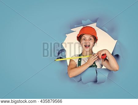 Construction Worker With Tape Measure. Cute Kid As A Construction Worker. Kid Repairing Home. Happy 