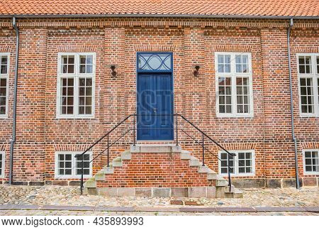 Steps And Blue Door Of A Historic Red Brick House In Viborg, Denmark