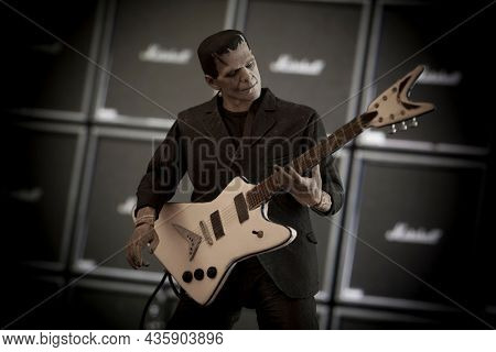 OCT 11 2021: Universal Frankenstein monster with electric guitar and wall of amplifiers - Neca Ultimate action figure