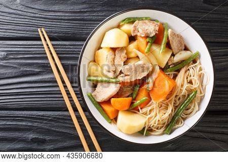 Japanese Meat And Potato Stew Nikujaga Close Up In Bowl On The Wooden Table. Horizontal Top View Fro