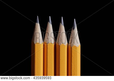 A bunch of pencils isolated on black background