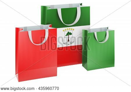 Shopping Bags With Equatoguinean Guinea Flag. Shopping In Equatorial Guinea, Concept. 3d Rendering I