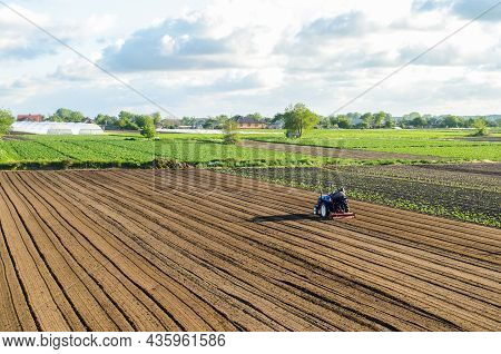Kherson Oblast, Ukraine - May 28, 2020: A Farmer Cultivates The Soil On The Site Of An Already Harve