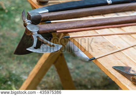 Viking Battle Ax Sharp Set Of Weapons Laid Out On The Table A Gunsmith Counter