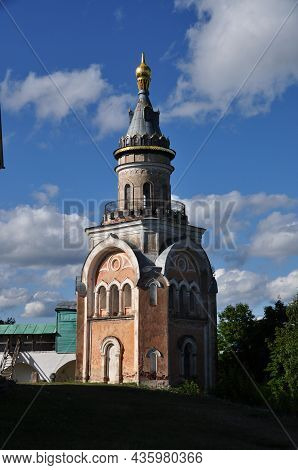 The Candle Tower Of The Borisoglebsk Monastery. Tower On The Background Of The Cloudy Sky. September