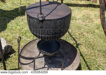 Cooking Equipment Replicas Used By Medieval Vikings Displayed By A Re-enactment Troupe At A Village 