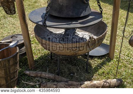 Cooking Equipment Replicas Used By Medieval Vikings Displayed By A Re-enactment Troupe At A Village 