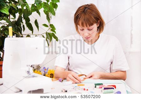 Working from home, a tailor at work.