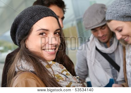 Portrait of university girl amongst group