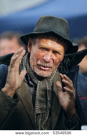 Homeless man gesticulating