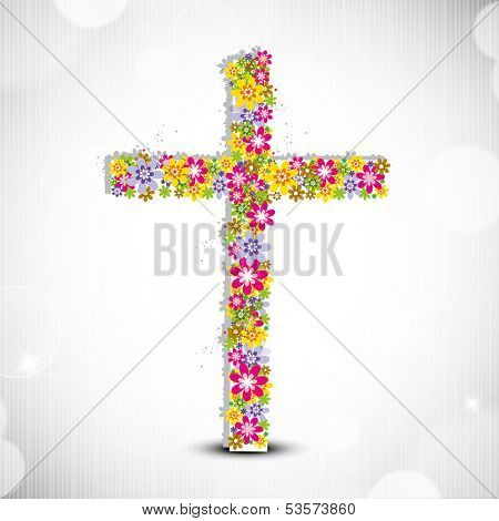 Merry Christmas celebration concept with floral decorated Christian Cross on shiny grey background. 	
