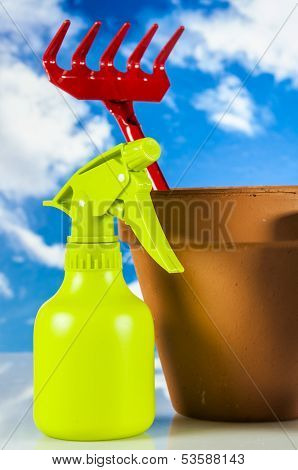 Bright, decorative gardening theme with blue sky background