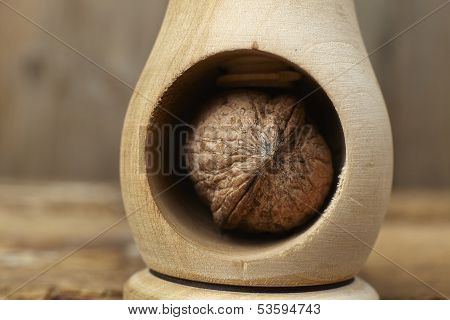 Walnuts Cracked Open With A Vintage Wooden Nut Cracker