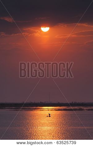 Fishermen On Sunrise On The Lake