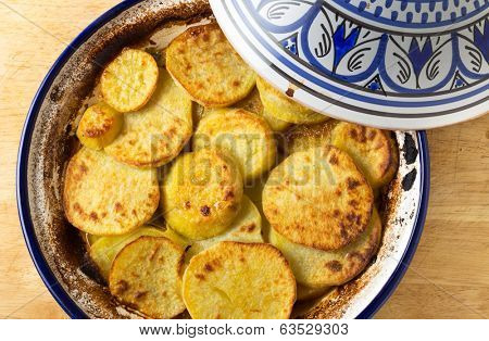 Moroccan sweet potato and beef tagine cooked in the bowl, from above. A traditional dish from Fez