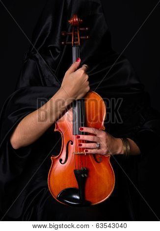 Female Violinist Holds Bow Across Saturated Musical Violin Acoustic Instrument