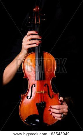 Female Violinist Holds Bow Across Saturated Musical Violin Acoustic Instrument