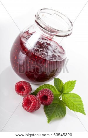 Raspberries And Jar With Jam