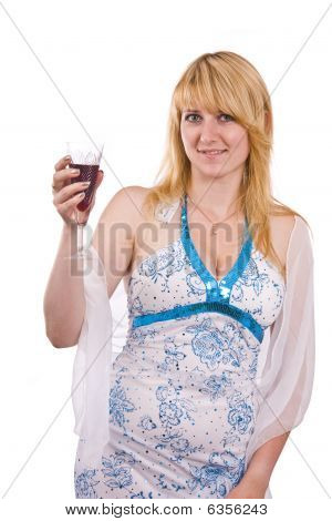 Femme avec un verre de vin.