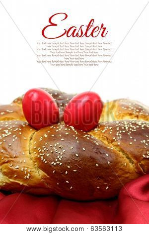 Easter sweet brioche with red eggs 