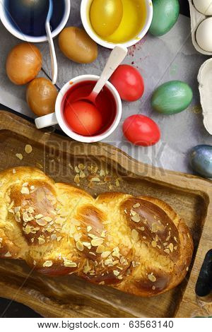 Easter sweet brioche, colored eggs and liquid dye