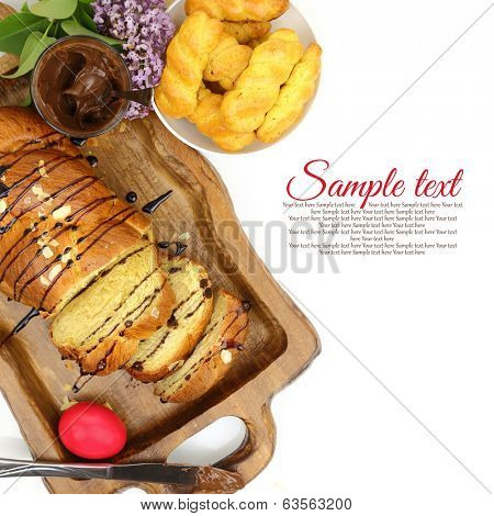 Easter sweet brioche on wooden tray 