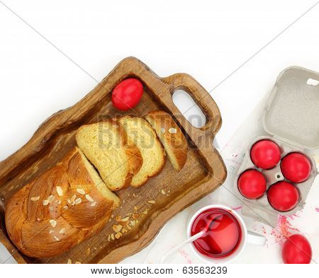 Easter sweet brioche, red eggs and liquid dye
