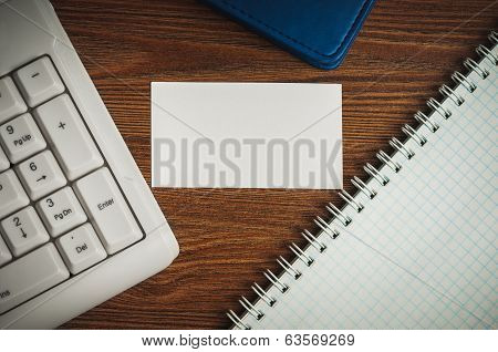 calling card on the wooden desk