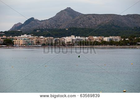 The beach with the evening-time in Alcudia on Majorca