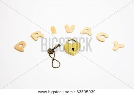 Brass Padlock And Key With The Word - Privacy