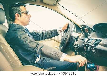 Business Man Driving His Car