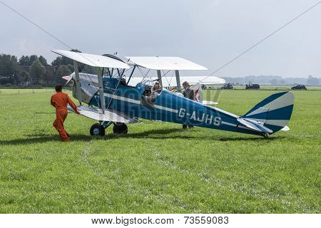 Historical Airplane With Pilot And Mechanics