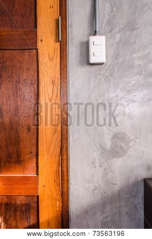 White Plastic Switch Panel Is On Loft Style Wall