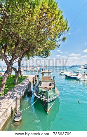 Harbor With Boat In Desenzano On Lake Garda, Italy