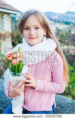 Outdoor portrait of a cute little girl