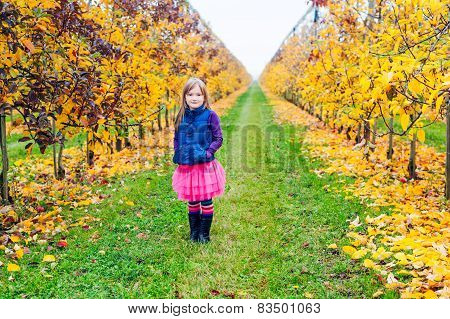 Outdoor portrait of a cute little girl