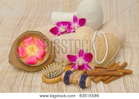 Spa Massage Setting With Rolled, Towel, Compress Balls And Aroma Candle