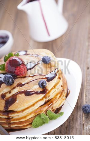 Delicious Sweet American Pancakes On A Plate With Fresh Fruits