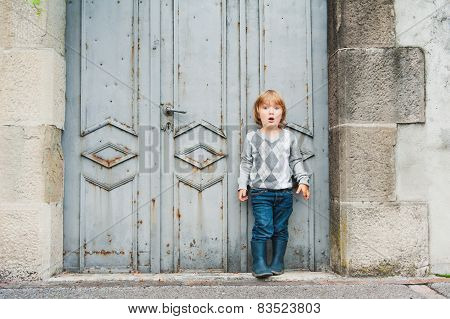 Outdoor portrait of a cute little boy