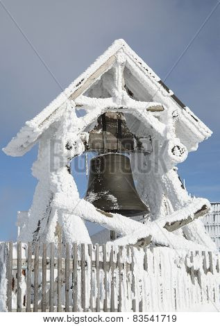 Bell with snow