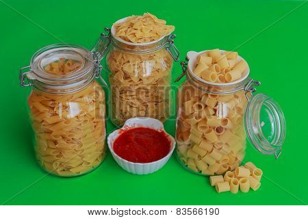 Three Jars Of Pasta With Red Sauce Bowl