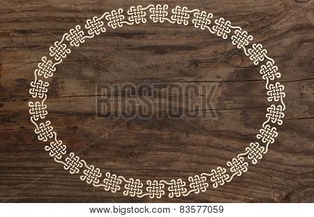 celtic border knotwork ornament old wooden background