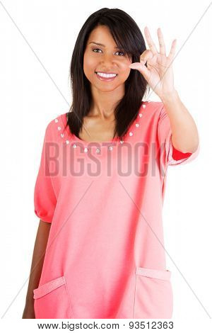 Beautiful mulato woman gesturing ok 